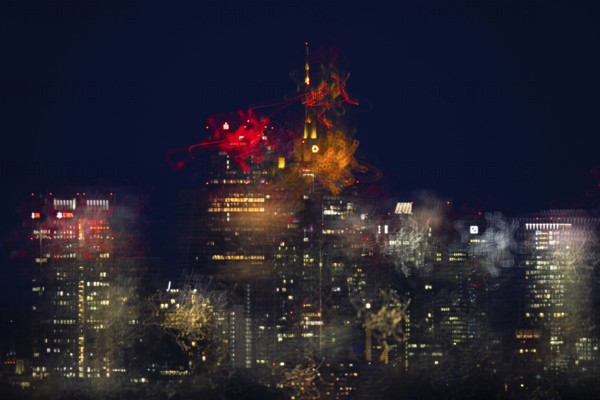 The lights of Frankfurt's banking skyline glow in the night. (long exposure), Frankfurt, Hesse, Germany