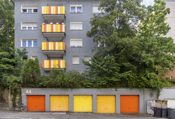 Apartment building in Werastrasse with colourfully painted balconies and garages. Stuttgart, Baden-Württemberg, Germany