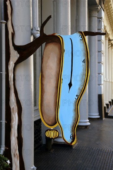 Entrance sign of an art gallery with a Salvadore Dali motif in downtown, New York City, USA