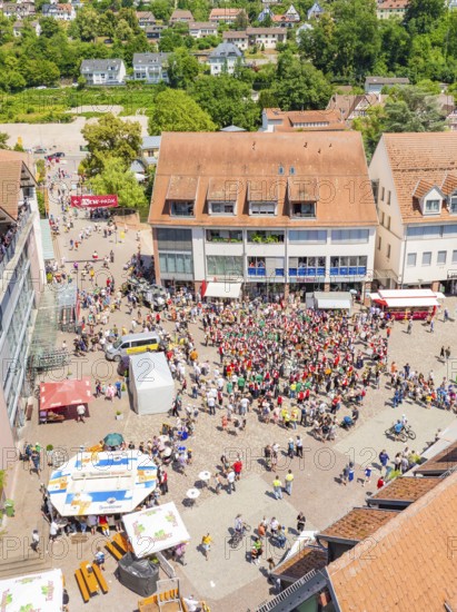 Large gathering of people on a market square, bird's eye view, 950 years of Calw, Calw parade, Black Forest, Germany