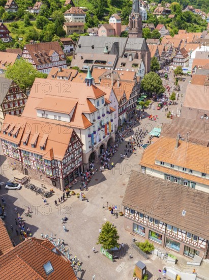 Aerial view of a half-timbered town with church and market square during a busy summer day, 950 years of Calw, Calw parade, Black Forest, Germany