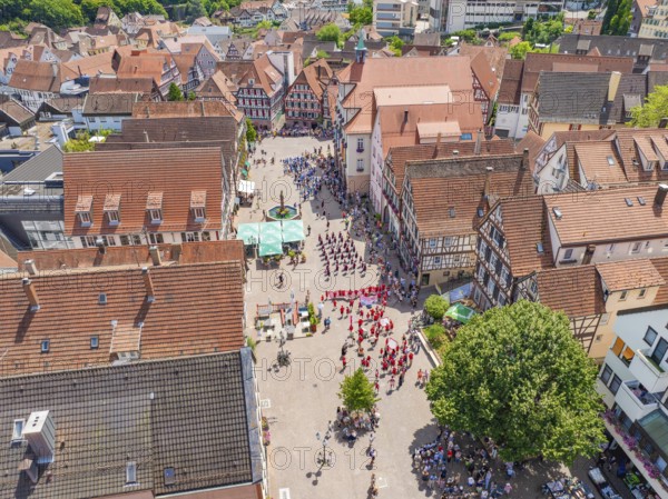 Aerial view of a historic town centre with an event and traditional architecture, 950 years of Calw, Calw parade, Black Forest, Germany