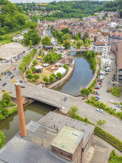 Aerial view of a cityscape with river, park and bridge in green surroundings, 950 years of Calw, Calw parade, Black Forest, Germany