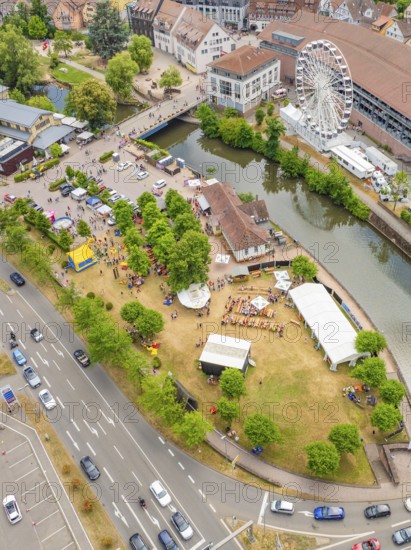Aerial view of a town with river, Ferris wheel and fairground in summer, 950 years Calw, parade Calw, Black Forest, Germany