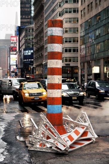 Construction site with chimney for exhaust air at an intersection, New York City, USA