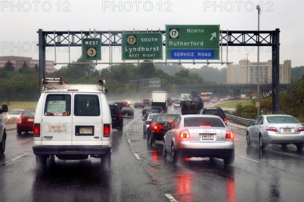 Rush hour on the motorway in the rain, New Jersey, USA
