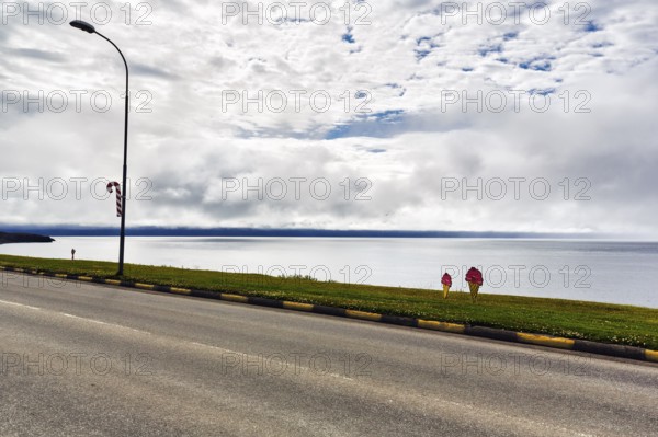 Ice cream cones and candy cane, coastal road, decoration on Candy Day, Candy Days, town festival in Husavik, Húsavík, North Iceland, Iceland