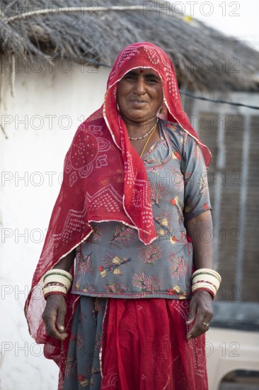 Indian woman, 55 years old, desert dweller in the Thar Desert or Great Indian Desert, near Jaisalmer, Rajasthan, India