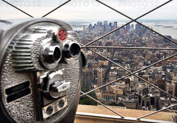 View of Down Town in rainy weather from the Empire State Building, left telescope, New York City, USA