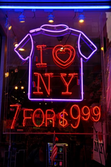 Illuminated advertising for T-shirts, New York City, USA