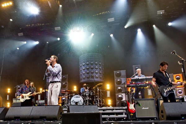 Marco Michael Wanda, singer, Manuel Christoph Poppe, guitarist, Reinhold Weber, bassist, from WANDA live on SCHÖN BEI DIR LIVE 2025-Tour at the Berlin Zitadelle on 12 July 2025