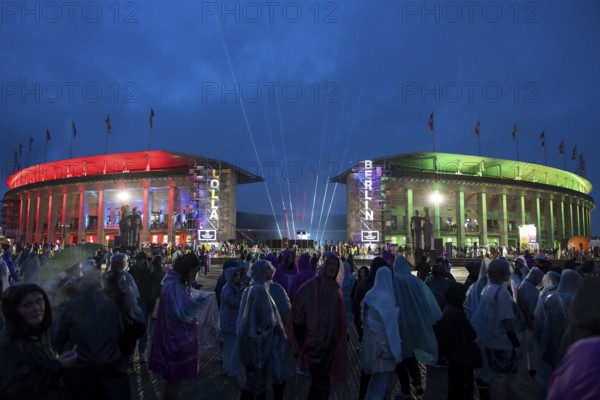 The Olympic Stadium is colourfully illuminated at the Lollapalooza Festival in the Olympic Stadium and on the Maifeld, Berlin, 12.07.2025