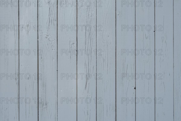 Light blue wooden wall with vertical planks and visible joints, simple and plain texture, background, Münsterland, North Rhine-Westphalia, Germany