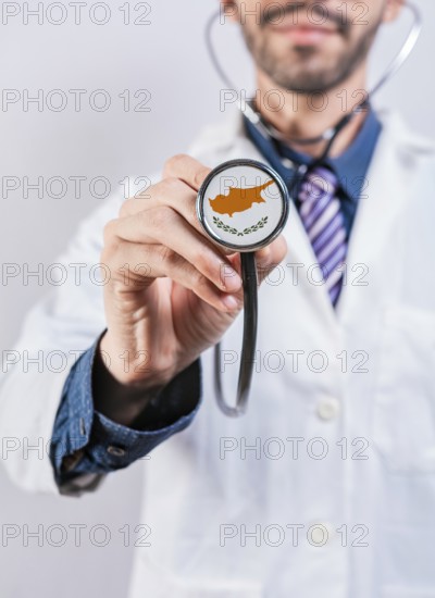 Chipre health and medical insurance concept. Chipre healthcare system, doctor holding stethoscope