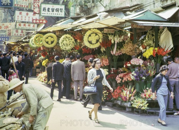 Captioned as 'Chinese flower stalls', Victoria, Hong Kong, Asia 1964