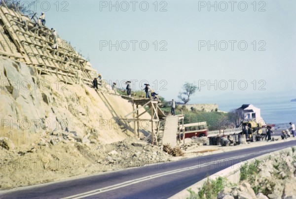 Captioned as 'Road widening', Pok Fu Lam, Hong Kong, Asia 1964
