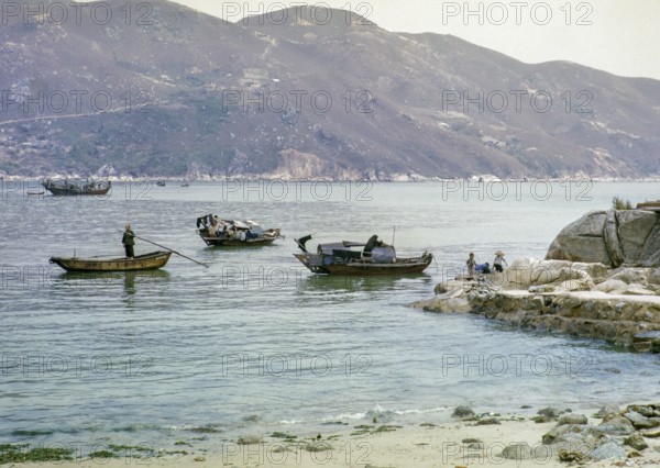 People living on sampan boats probably at Tide Cove, New Territories, Hong Kong, Asia, 1964