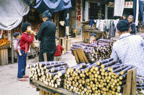 Sugar cane stall at street market, Tai Po, New Territories, Hong Kong, Asia, 1964