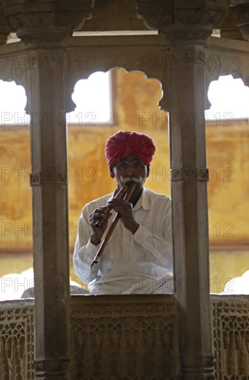 Rajasthani folk musician with an alghoza or bamboo flute, Jaisalmer, Rajasthan, India
