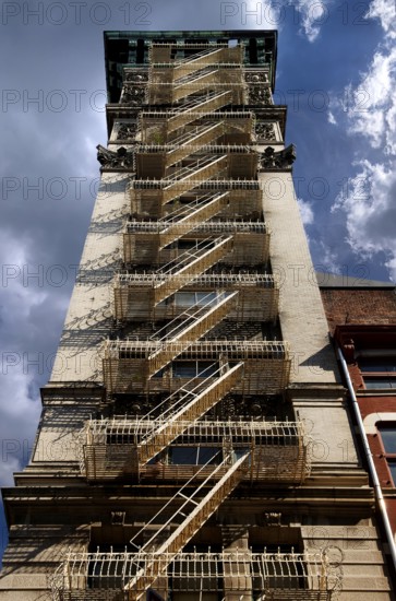 Residential tower with fire escape Downtown, New York City, USA