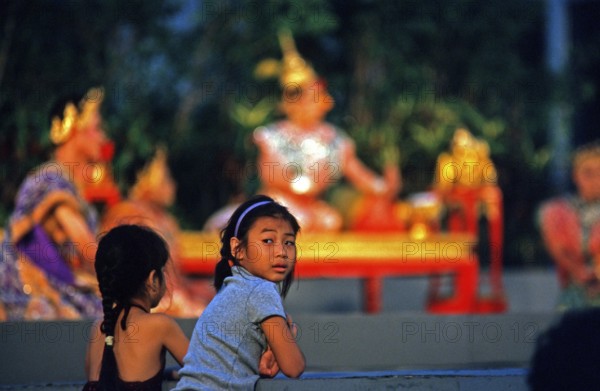 Children watch Thai drama performance, Bangkok, Thailand, December 2002, vintage, retro, old, historical