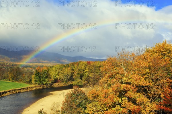 Scenic river landscape with rainbow, Saco River in Mount Washington Valley, fall leaves, Indian summer, sunny weather, Conway, Kancamagus Highway, White Mountain, New Hampshire, New England, USA