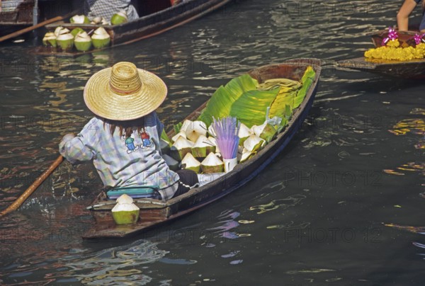 Merchant in her boat at Damnoen Saduak Floating Market, Thailand, December 2002, vintage, retro, old, historic