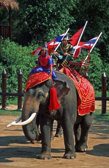 Performance with elephants at Samphran Elephant Ground and Zoo near Bangkok, Thailand, December 2002, vintage, retro, old, historic