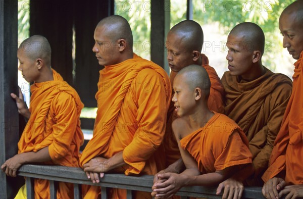 Monks watch performance, Samphran Elephant Ground and Zoo near Bangkok, Thailand, December 2002, vintage, retro, old, historic