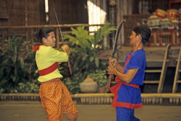 Performance of a traditional sword fight in the Rose Garden near Bangkok, Thailand, December 2002, vintage, retro, old, historic