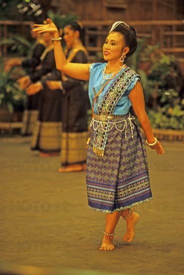 Performance of traditional dances in the Rose Garden near Bangkok, Thailand, December 2002, vintage, retro, old, historic