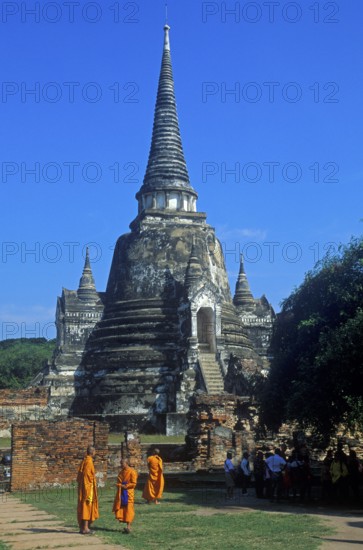 Monks, chedi at Wat Phra Si Sanphet, Ayutthaya, Thailand, December 2002, vintage, retro, old, historic