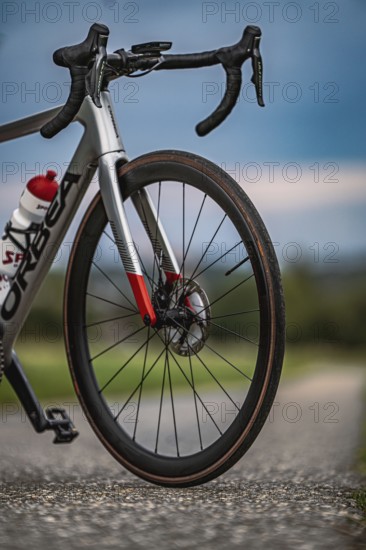 Detailed view of a bicycle shop in natural surroundings under cloudy sky, Triathlon, Calw, Germany