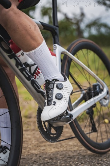 Detail of a cyclist focusing on shoes and pedals while riding, triathlon, Calw, Germany