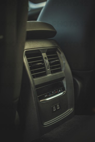 Ventilation grille in the interior of a car in dark colors, BMW i7 electric car, Deer e-Carsharing, Calw, Germany