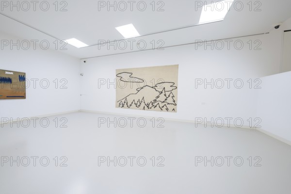 A minimalistic gallery space with a mountain work of art on the wall, Schauwerk, Sindelfingen, Germany