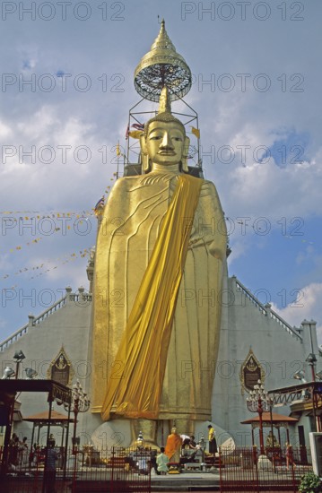 Standing Buddha at Wat Indrawihan, Bangkok, Thailand, December 2002, vintage, retro, old, historic