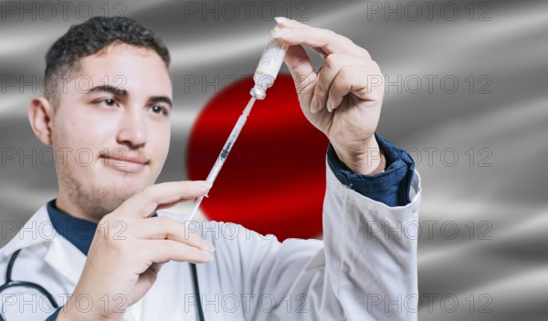 Doctor holding syringe on Japan flag background. Medical professional holding syringe with Japanese flag in the background