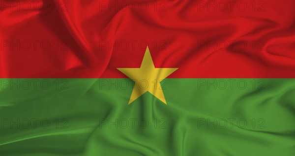 Realistic Burkina Faso flag waving. Close up of flag of Burkina Faso with cloth texture