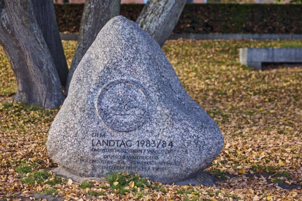 Memorial stone, Parliament 1983 - 84, Umweltschutzverein Wahlstedt, German Forest Youth, Timber Industry, H.H. GLF Trade Union, German Forest Protection Association, trees, hedge, meadow, fallen leaves, depth of focus, sunny, Kiel, state capital, district-free city, Schleswig-Holstein, Germany