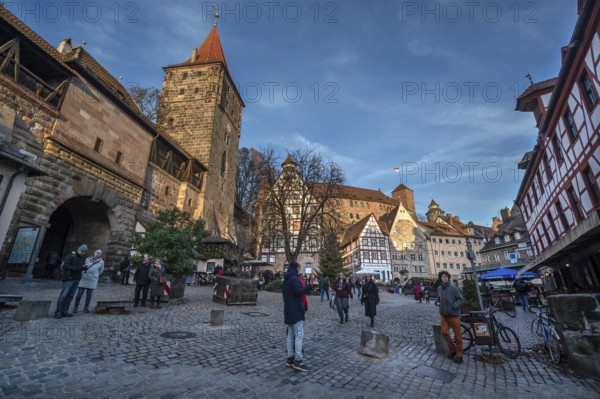 Medieval Tiergärtnertorturm, historic half-timbered houses and Kaiserburg, Tiergärtnertor in the evening light, Nuremberg, Middle Franconia, Bavaria, Germany