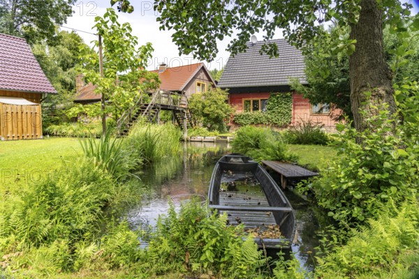 Canal and residential buildings in the Spreewald near Lübbenau/Spreewald, Brandenburg, Germany