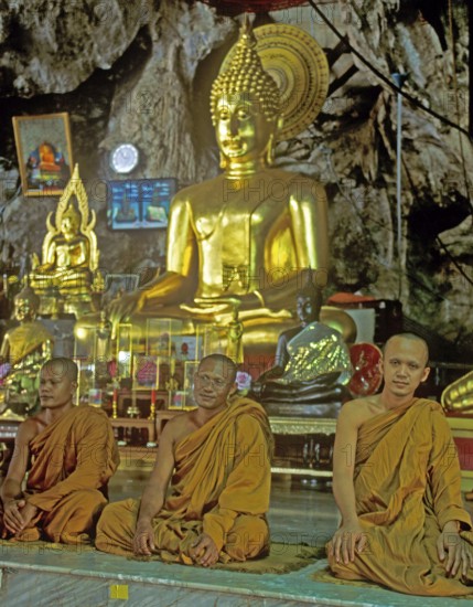 Buddha statue, monks praying, Wat Tam Sua monastery near Krabi, Thailand, December 2002, vintage, retro, old, historic