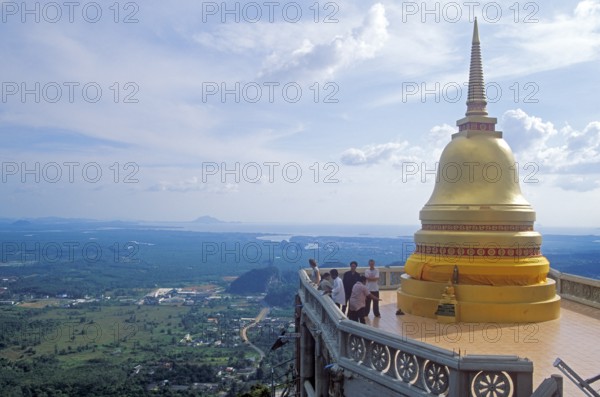 View, people, chedi in the monastery of Wat Tam Sua, which is partly on the top of a mountain, Krabi, Thailand, December 2002, vintage, retro, old, historic