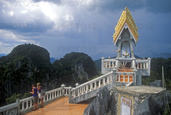 People, shrine in Wat Tam Sua monastery, which is partly on the top of a mountain, Krabi, Thailand, December 2002, vintage, retro, old, historic