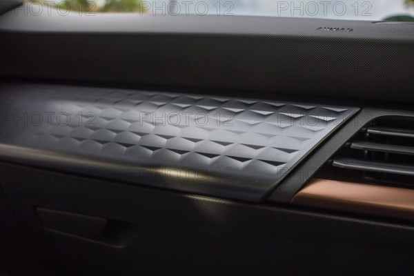 Close-up of a modern, structured dashboard in a vehicle with elegant design elements, Cupra electric car, e-car sharing, Calw, Germany