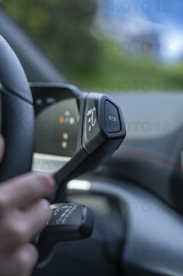 Close-up of a hand on a gear stick in a modern vehicle, Cupra electric car, e-car sharing, Calw, Germany