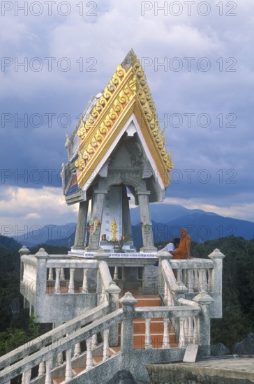 Monk in the monastery of Wat Tam Sua, which is partly on the summit of a mountain, near Krabi, Thailand, December 2002, vintage, retro, old, historic
