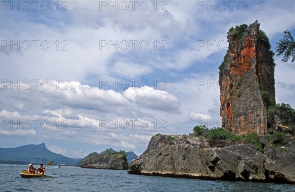 Boat, people, rocks in the sea, Krabi, Thailand, December 2002, vintage, retro, old, historic