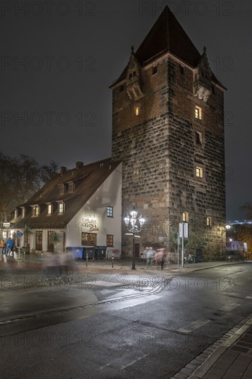 Medieval debt tower in evening lighting, built around 1323, front island of Schütt, Nuremberg, Middle Franconia, Bavaria, Germany